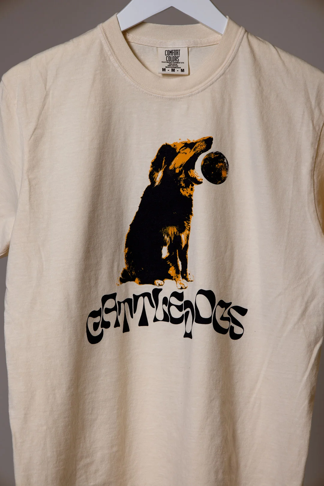 The Cattledogs T-shirt at the merch table